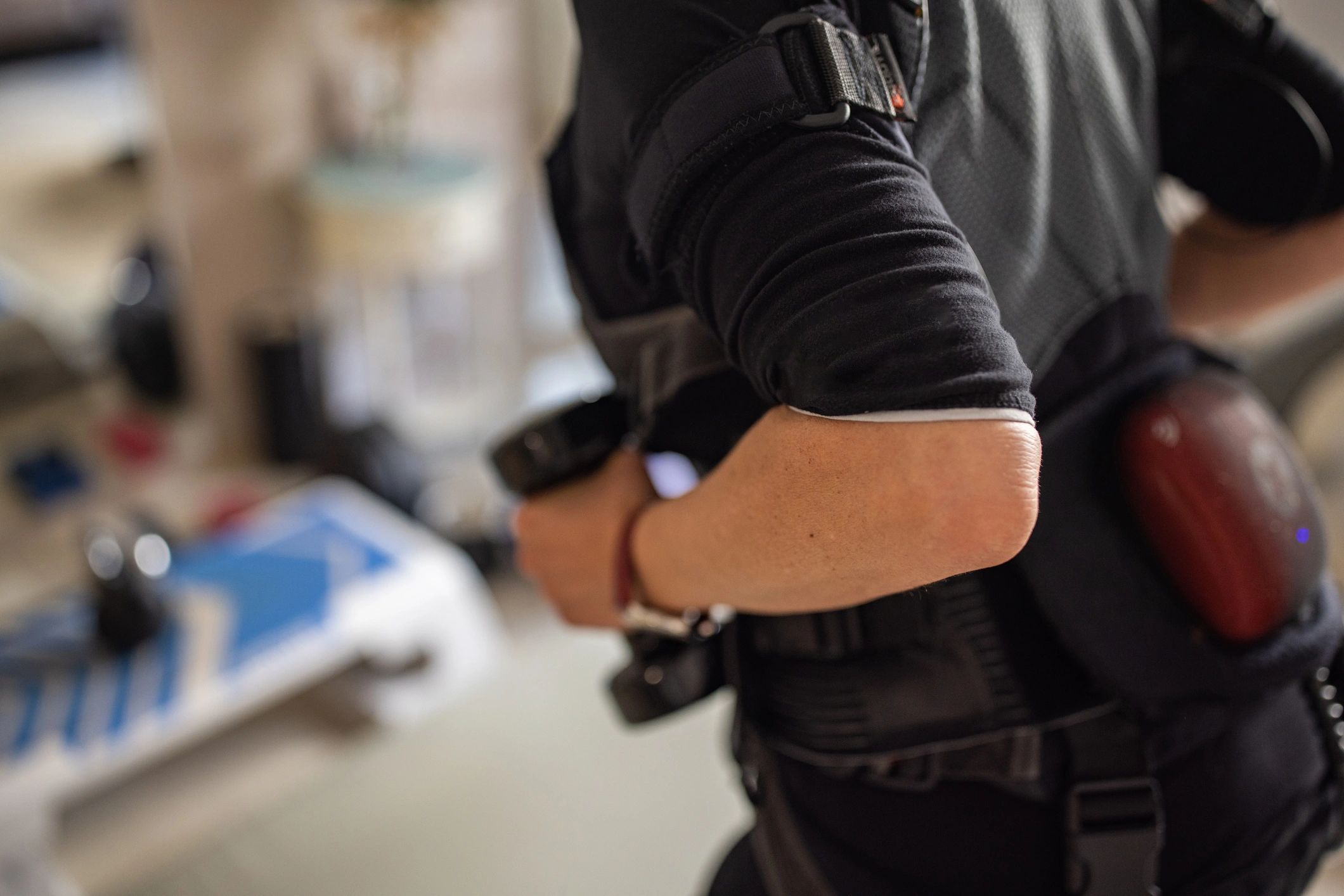 Client exercising in an EMS suit