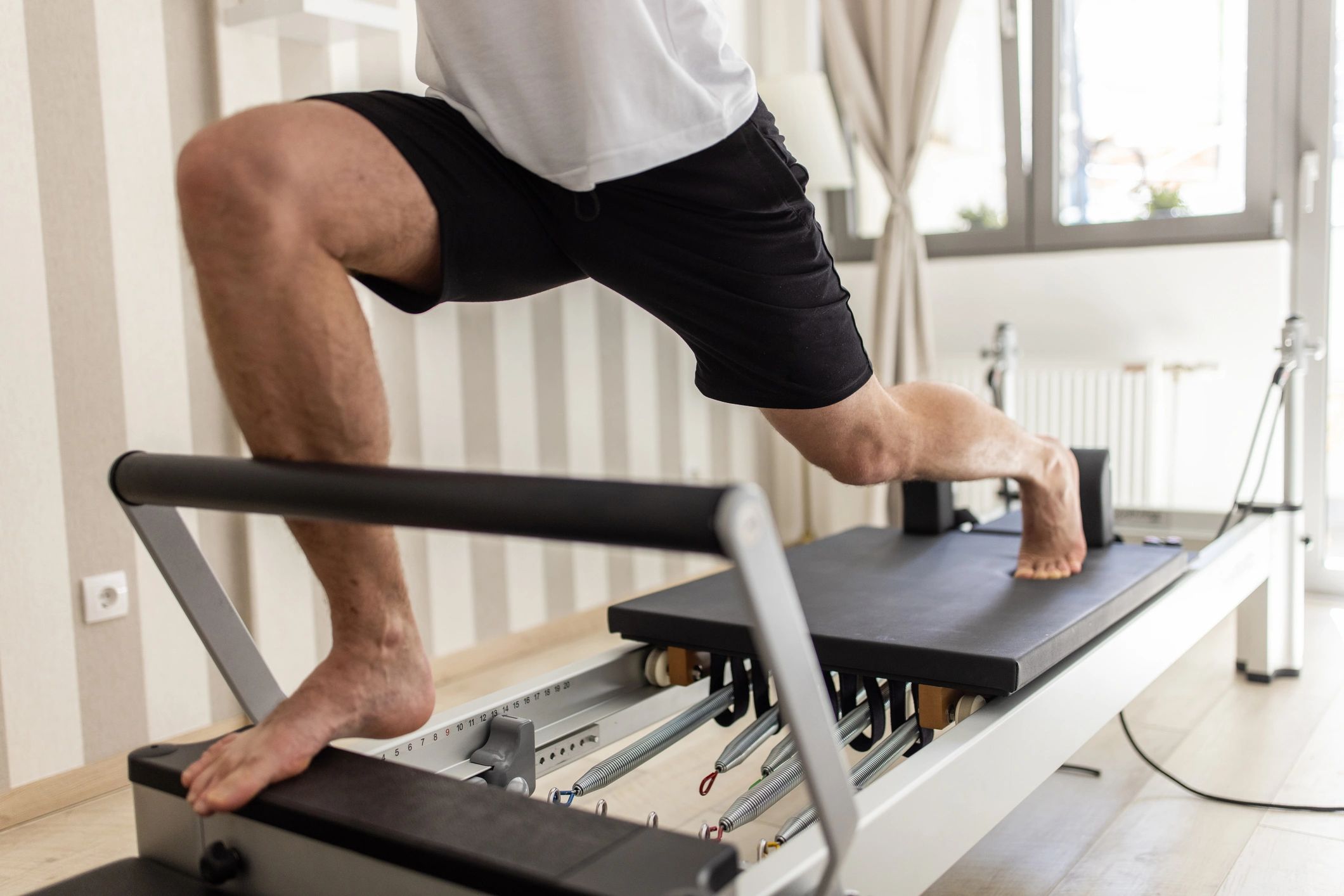 Man training on a fitness machine