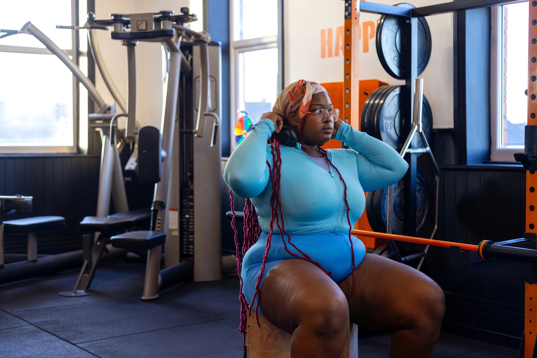 Athlete strength training on a gym machine